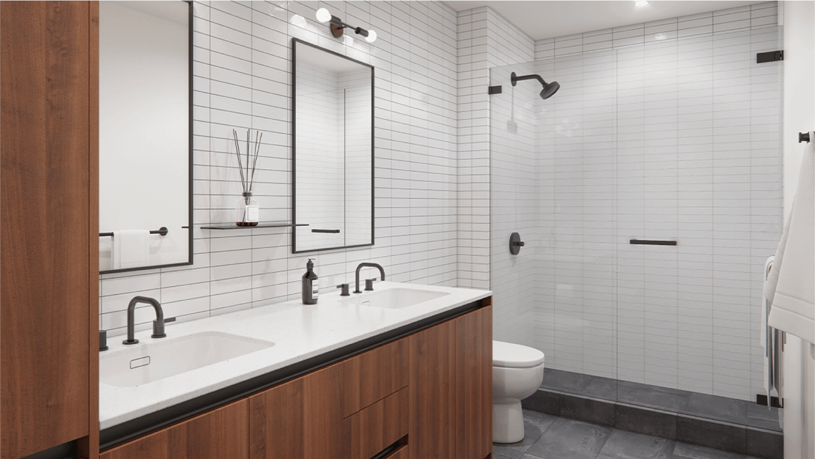 Minimalist design bathroom with a sophisticated double vanity, black fixtures, and a glass-enclosed shower, reflecting upscale urban living in Austin.