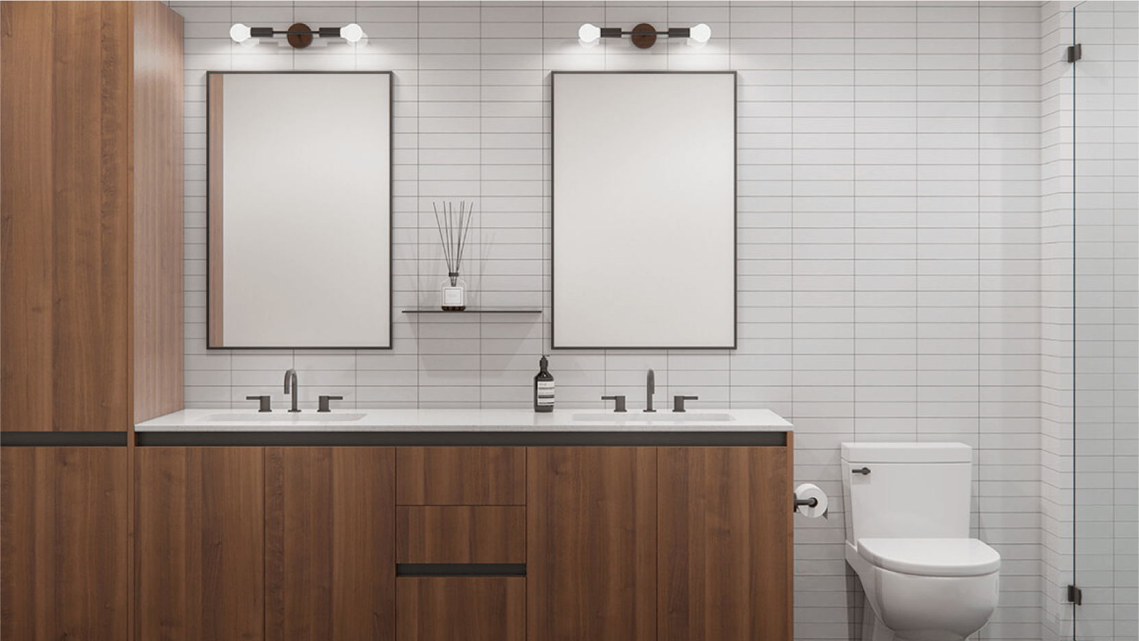 Sleek and modern bathroom at Vesper ATX, showcasing a double vanity with wood finishes, large mirrors, and white subway tiles.