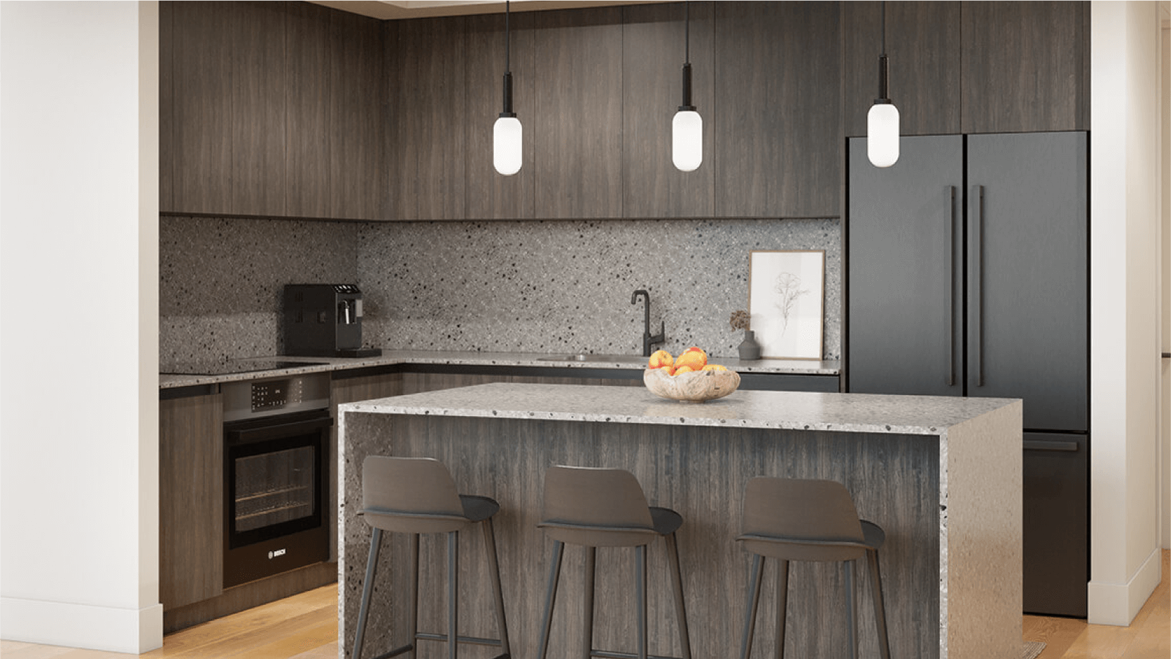 Vesper ATX has contemporary kitchens with terrazzo countertops, dark wood cabinetry, and state-of-the-art appliances, highlighted by elegant pendant lights and a minimalist aesthetic.