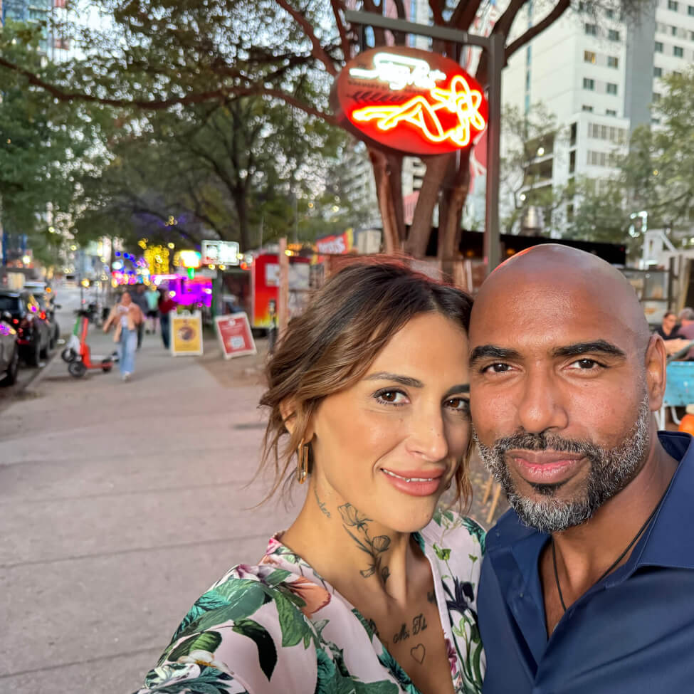 Image of couple in downtown Austin in the Rainey Street District by the Vesper Residences.