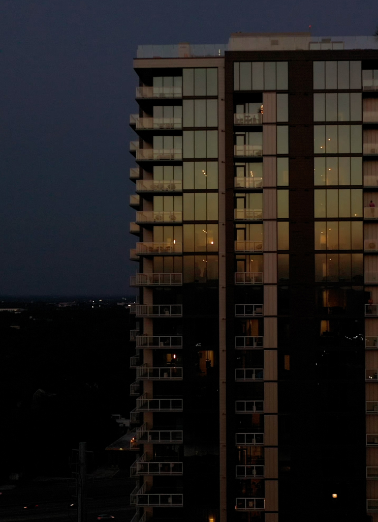 Twilight view of the exterior of Vesper Residences.
